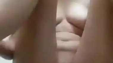 Nude Desi girl with perky XXX tits massages her wet sissy on camera