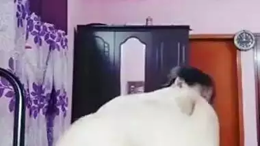 Nerdy college girl from India shakes big buttocks and spanks it