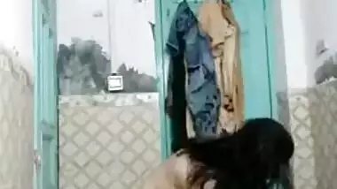 Pakistani Desi XXX wife undresses and shows her hot body in bathroom