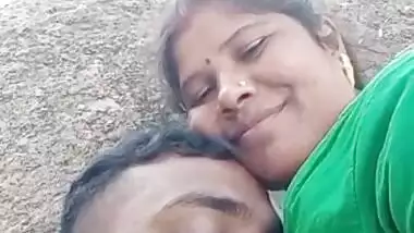 Sucking big boobs of Bhabhi outdoors on cam