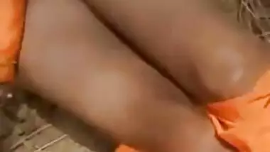 Man watches Desi girlfriend in orange sari taking pants off for XXX video