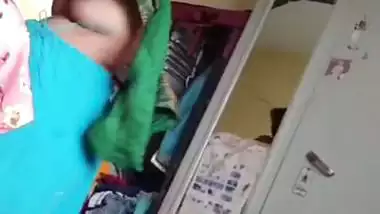 Grandmother wearing blouse and showing naked boobs