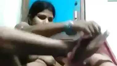 Unsatisfied village wife fingering pussy in horniness