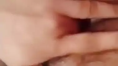 Indian girl nude MMS of a girl fingering her hairy pussy