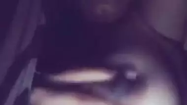 Indian aunty squeezes her own boobs like crazy in close-up video