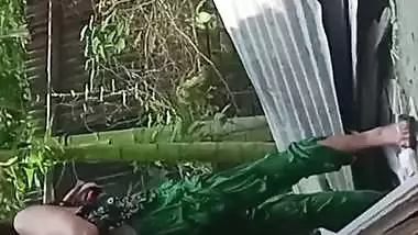 Village neighbor girl outdoor bath caught through hole