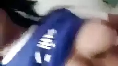 Beautiful desi girl lifting top to reveal sexy boobs